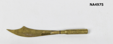 Brass paper knife made in scimitar shape with handle formed from bullet.