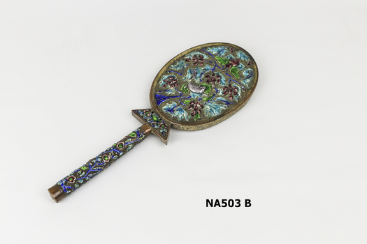 Repousse, embossed ,enamel, decorated  hand mirror