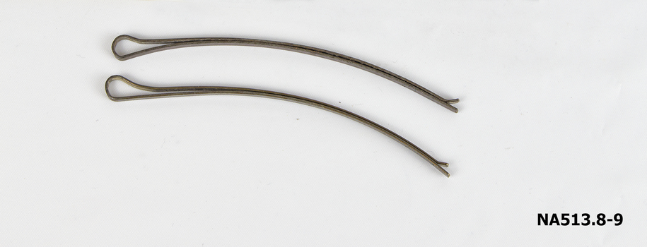 Water Wave Set comprising:  1 dish, 6 curved combs, 1 packet pins, 1 box containing hair net and 13 large hair pins. A total of 22 items.