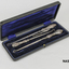 Button hook set - black oblong box lined with dark blue satin and velvet 