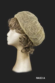 Spotted fine mesh cap with elasticised edge