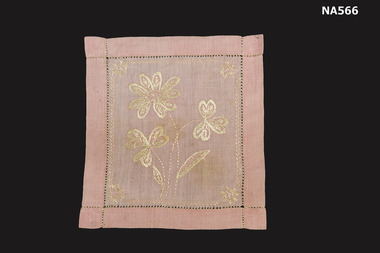 Pink napkin hand embroidered with cream silk
