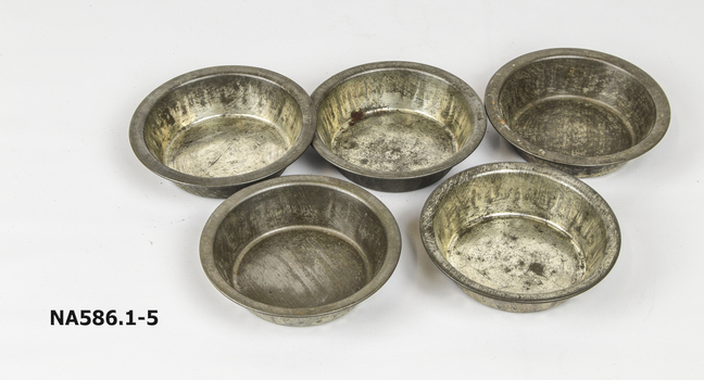 Five round pie tins.