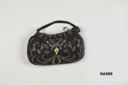 Black beaded bag (evening) beaded handle . 