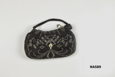 Black beaded bag (evening) beaded handle . 
