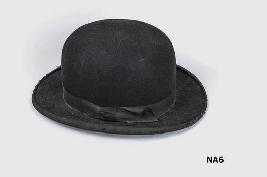 Man's Bowler hat with ribbon.