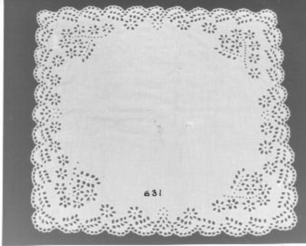 White cotton handkerchief with deep Broderie Anglaise border . 