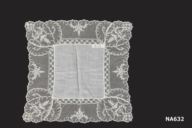 White lawn handkerchief with deep lace border
