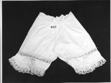 White cotton drawers with crocheted lace insets and border.