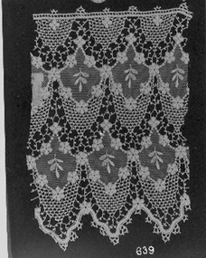 Cream lace piece used for demonstration purposes.
