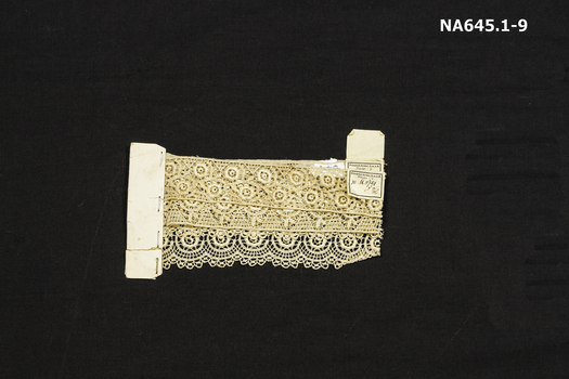 Piece cream lace used for demonstration purposes.