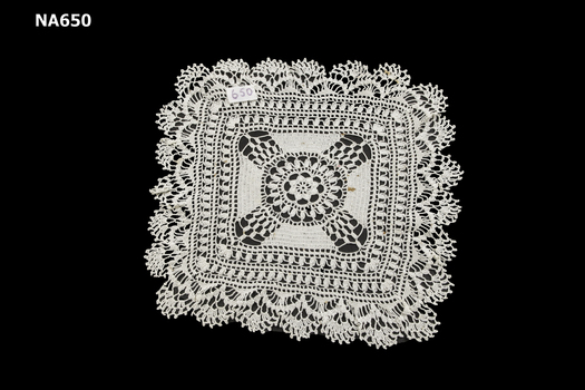 White cotton crocheted square doyley