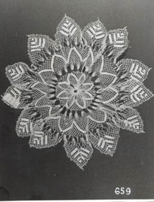 White round doyley made in netted lace
