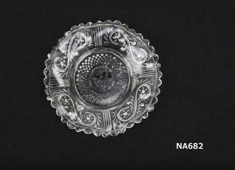 Small decorated glass saucer