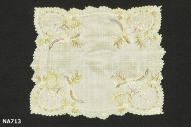 silk handkerchief which is heavily embroidered