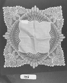 Cream silk handkerchief with deep border of Maltese lace