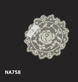 Small round doyley made of filet lace