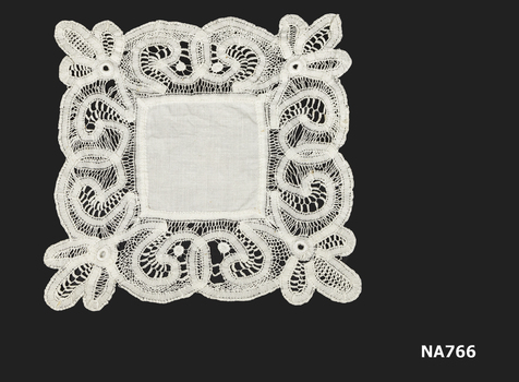 White doyley with needle lace