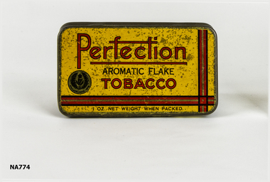 Yellow Tobacco tin  'Perfection Aromatic Flake Tobacco' written in red.