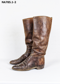 High brown leather male riding boots.