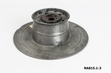 Pewter ink well stand - large round base with centrepiece for inkwell and holes for pens. Bakelite and pen included.