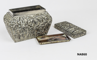 Decorative silver type box.  Separate lid.  Bamboo leaves patter