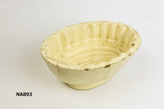 cream china jelly mould with grooves inside bowl to form patterns on jelly