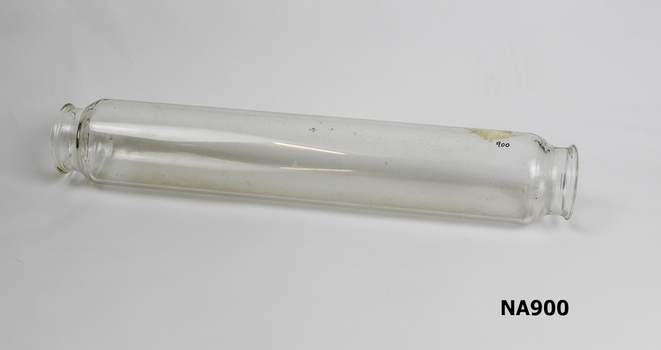 Glass rolling with open ends , possibly used with iced water for rolling out pastry.