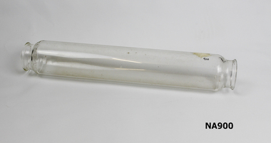 Glass rolling with open ends , possibly used with iced water for rolling out pastry.