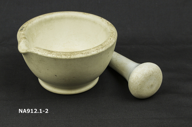 Stoneware mortar and pestle used for grinding seeds, nuts, etc