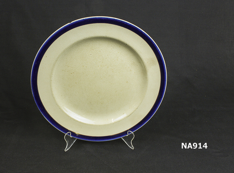 White porcelain plate with dark blue stripe