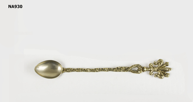 Small spoon with long decorative handle