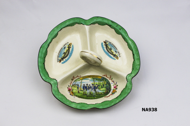 Savoury dish with three compartments and finger ring handle. 