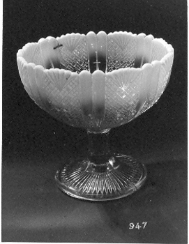 Blue glass bowl on stand in graduations of blue cut glass. Has been damaged see condition report.