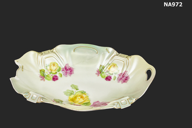 Large oval China dish - light green with red and yellow roses and gold trim.