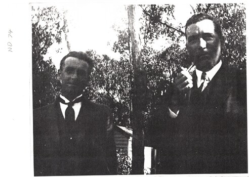 Photocopy of photograph with accompanying notes identifying Sir Robert Menzies and Mr. Norman Armstrong taken in 1930.
