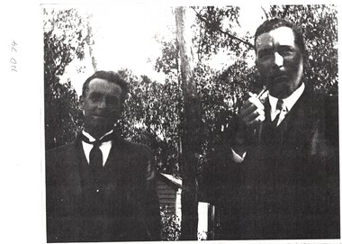Photocopy of photograph with accompanying notes identifying Sir Robert Menzies and Mr. Norman Armstrong taken in 1930.
