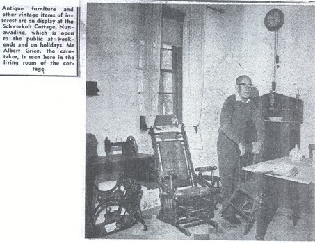 Schwerkolt Cottage has been furnished with vintage items of interest as evidenced by a living room photo of Albert  Grice, caretaker.