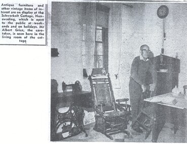 Schwerkolt Cottage has been furnished with vintage items of interest as evidenced by a living room photo of Albert  Grice, caretaker.