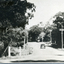 B/W photo mounted on board depicting bridge at Blackburn Road with car in picture.