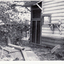 Black and white photo of Well at rear of original  post office in 1876