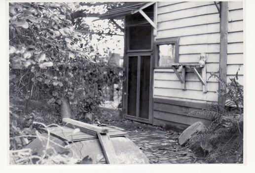 Black and white photo of Well at rear of original  post office in 1876