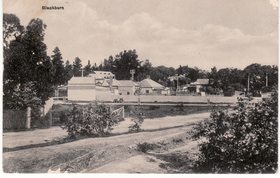 Black and white postcard entitled 'Blackburn'   Scene shows corner Railway and Blackburn Roads, Albert Street unmade.