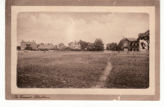 Sepia postcard entitled 'The Crescent, Blackburn'.ow Gordon Crescent, Blackburn.  Picture shows Victorian and Edwardian homes.|Probably these homes were part of the land boom of the 1890s.
