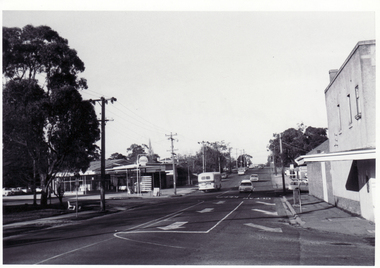 Black and white photo looking south along Blackburn Road from Railway gates in June 1969.