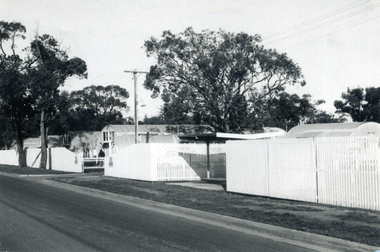 Black and white photo of Migrant Hostel, Rooks Road, Nunawading showing the old side Nissin hut accommodation.