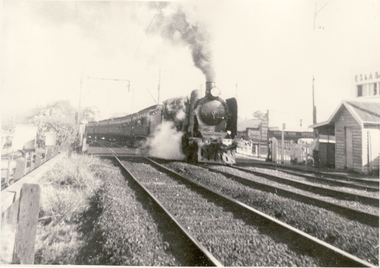 Black and white photo of locomotive K184 on special train passing through Blackburn Railway Gates.