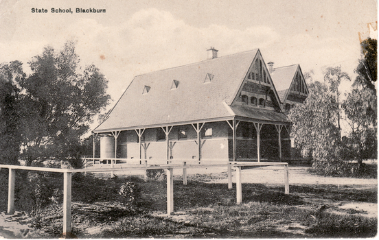 Black and white postcard entitled 'State School, Blackburn'.  On corner of Whitehorse and Surrey  Roads Blackburn