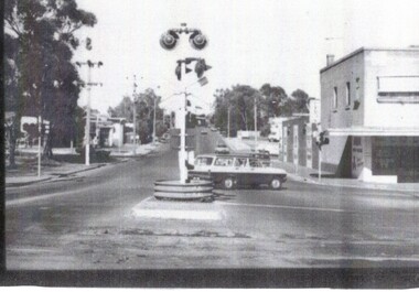  B/W strip photo of Blackburn Road Railway Crossing.