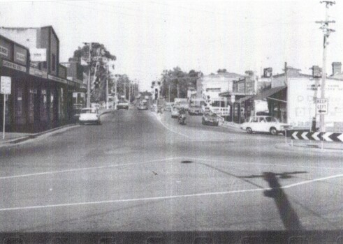 B/W strip photo of Blackburn Road Railway Crossing.